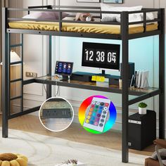 a bunk bed with a desk underneath it and a clock on the wall next to it