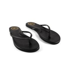 Vegan Leather Flexible Rubber Outsole with Signature Wave Design Cushioned Arch Support & Footbed Made in Brazil Half-Size Wearers, Size Up Sleek Flip Flops With Single Toe Strap For Beach, Sleek Synthetic Flip Flops For Beach, Adjustable Arch Support Flip Flops, Adjustable Arch Support Flat Flip Flops, Sleek Sandals With Cushioned Footbed For Beach, Sleek Open Toe Flip Flops For Beach, Sleek Toe Post Flip Flops For Beach, Open Toe Gel Cushioned Flip Flops For Beach, Sleek Round Toe Flip Flops For Beach