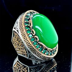 Man Green Jade Stone Ring , Silver Large Stone Ring , Ottoman Style Embroidered Ring , Turkish Handmade Sterling Silver Ring , Gift For Him ★Item Details * Gender : Male / Female * Material : 925K Sterling Silver * Total weight : 50 Grams * Gemstone : Jade Stone ✔ Ready to Ship in 1-2 Business Days .. ✔ Shipped to the Worldwide 1-5 business days with free shipping... ✔ The product will be sent to you with a handmade wooden box to avoid any damage during shipping... ✔ Visit our store, browse othe Elegant Green Ceremonial Rings, Green Gemstone Jewelry For Ceremonial Use, Green Gemstone Jewelry For Ceremonial Occasions, Luxury Green Crystal Ring In Open Ring Style, Luxury Engraved Green Rings, Green Oval Enamel Ring For Formal Occasions, Intricate Emerald Ring For Gift, Green Oval Signet Ring For Wedding, Oval Green Signet Ring For Wedding