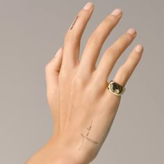 Embrace understated opulence with our gold-plated pinky ring, crowned with a solitary zirconia dot. A delicate statement, this piece seamlessly marries minimalist elegance with bold individuality. 18K gold plated stainless steel Solitary zirconia dot Dainty Gold Signet Ring For Promise, Gold Minimalist Initial Ring For Promise, Minimalist Gold Initial Ring For Promise, Minimalist Yellow Gold Promise Signet Ring, Gold Midi Promise Rings With Simple Design, Pinky Ring, Ring Size Guide, Polish Jewelry, Solid Gold