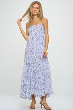 A gorgeous ditsy floral pattern flows throughout this whimsical asymmetric tiered maxi dress. Embroidery detail and unique seaming give a luxe, feminine feel to this warm-weather style. Pair with slide sandals or block heels to elevate the look. Product Details Material: 100% Polyester. Fit: True to size. Body length: 52" from shoulder to hem (size Small). Fabric: Lightweight chiffon.Features: Adjustable spaghetti straps, asymmetric tiers, raised hemlines, embroidered white flowers, fully lined. Ditsy Floral Pattern, Dress Embroidery, Lilac Dress, Dinner Dress, Cotton Maxi, Maxi Dress Cotton, Tiered Maxi Dress, Menswear Inspired, Embroidery Details