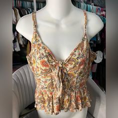 New With Tags. Super Cute Floral Blouse.Size Large With Adjustable Straps. Gives Off A Hobo Style Trendy Multicolor Rayon Tops, Floral Print Cami Top For Day Out, Summer Rayon Tops For Day Out, Rayon Summer Tops For A Day Out, Summer Rayon Crop Top, Bohemian Printed Cami Top, Trendy Floral Print Rayon Top, Patterned Sleeveless Blouse, Summer Rayon Blouse