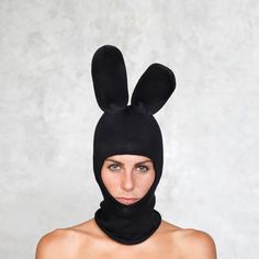 BLACK BUNNY BALACLAVA Slide on our Bunny Balaclava before you hop on over to the nearest party. Adjustable to be worn over the mouth or tucked under your chin, and the ears are bendable and hold their shape. Perfect to wear on the ski hill, or year round to Halloween parties, Burning Man, Birthday parties, or any celebration/festival you have planned! DETAILS Available in two colors: pink or black 100% cotton knit One Size Fits All Wash on cold, hang to dry Created by Spencer Hansen --- BLAMO NE Adjustable Black Costume Accessories For Winter, Black Adjustable Costume Accessories, Novelty Black Costume Accessories For Winter, Black Novelty Costume Accessories For Winter, Fitted Black Novelty Costume Hats And Headpieces, Black Fitted Novelty Costume Hats And Headpieces, Novelty Black Costume Hat, Black Novelty Costume Hat, Bunny Balaclava