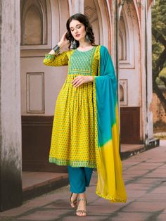 "ＭＦ ＳＴＯＲＥ ＩＮＤＩＡ SIZE            BUST  S  ----------  36  M ---------  38  L ----------  40  XL --------  42  XXL ------  44 Shop our chic Women's Cotton Rayon Nayra Cut Yellow color Kurta Pant and Dupatta Set for the ideal outfit for modern women. This stylish suit was produced from premium-grade cotton rayon fabric with comfort and elegance in mind. It has a flattering silhouette. This stylish kurta, pant, and dupatta combo will make you stand out whether you're going on a casual outing or attending a major event. Don't miss the chance to add this trendy addition to your wardrobe today!\" Key features: 𝐏𝐫𝐞𝐦𝐢𝐮𝐦 𝐐𝐮𝐚𝐥𝐢𝐭𝐲 𝐅𝐚𝐛𝐫𝐢𝐜: Crafted from a blend of cotton and rayon, ensuring maximum comfort and breathability. 𝐍𝐚𝐲𝐫𝐚 𝐂𝐮𝐭 𝐃𝐞𝐬𝐢𝐠𝐧: Flaunt a contemporary look Fitted Salwar Kameez For Puja With Traditional Drape, Fitted Traditional Salwar Kameez For Puja, Anarkali Style Mulmul Palazzo Set For Navratri, Navratri Salwar Kameez With Resham Embroidery, Anarkali Palazzo Set With Resham Embroidery For Festivals, Bollywood Style Mulmul Palazzo Set With Resham Embroidery, Mulmul Anarkali Set For Festivals, Yellow Bollywood Mulmul Sharara, Yellow Bollywood Sharara