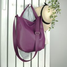 Multifunctional purple leather purse, huge vegan boho tote, slouchy hobo bag for women, shoulder handbag with zipper, convertible crossbody You really love this beautiful convertible 3in1 purple bag for women.  It's multifunctional - you can carry it in your hand, as slouchy hobo handbag, shoulder purse or huge boho crossbody tote. Durable, practical - fastened with a zipper, roomy - fits everything you need inside. Easy to clean and pack, made of high quality vegan leather, cruelty free, handma Cheap Trendy Purple Hobo Bag, Chic Purple Bucket Bag For Everyday, Purple Bucket Bag Tote For Travel, Purple Tote Bucket Bag For Travel, Purple Leather Hobo Tote Bag, Purple Hobo Bag For Daily Use, Purple Hobo Bag Satchel For Daily Use, Purple Satchel Hobo Bag For Daily Use, Purple Soft Leather Shoulder Bag For Everyday