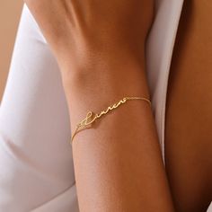 Gold Initial Bracelet, Personalized Name Bracelet, Minimalist Jewelry, Handmade Jewelry, 14K Gold Charm Bracelet, Gift for Her Discover the perfect blend of elegance and personalization with our Gold Initial Bracelet. Handcrafted with care, this minimalist jewelry piece is designed to add a touch of sophistication to any outfit. Made from high-quality 14K gold, this bracelet is the ideal accessory for women who appreciate timeless, stylish details. Our Initial Bracelet is a stunning example of handmade jewelry, combining a delicate gold chain with a customizable charm. Whether you're looking for a unique birthday gift or a special gift for her, this bracelet makes a heartfelt and thoughtful gesture. The fine craftsmanship ensures that it will become a cherished part of her jewelry collecti Elegant Custom Name Bracelet For Birthday Gift, Minimalist Yellow Gold Bracelets For Mother's Day, Minimalist Custom Name Bracelets, Elegant Yellow Gold Bracelets For Birthday Gift, Elegant Yellow Gold Bracelet For Birthday Gift, Elegant Yellow Gold Bracelet For Birthday, Dainty Name Bracelet For Birthday Gift, Minimalist Custom Name Bracelets For Birthday, Minimalist Name Bracelet For Birthday