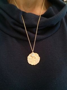 If you want to pay with PayPal, please contact me. Necklace details: * The necklace and the pendant made from 14 karats solid yellow gold. * Chain length 17.7inc\ 45cm. * 1 Diamond 0.50ct HVS1. * 50 Diamonds 0.50ct 0.01ct each HVS1. * Gold pendant size 1inch/ 25mm. Each pendant is custom made unique and will have slight variations in shape. Special delicate gold pendant bezel set with natural diamonds. Look like an antique pendant removed from the ground. Hand-made one of a kind. Chain available Elegant Gold Diamond Necklace With Large Pendant, Diamond Necklace With Large Pendant As Gift, Diamond Necklace With Large Pendant For Anniversary, Gold Medallion Diamond Necklace Gift, Gold Medallion Diamond Necklace As Gift, Gold Pendant Diamond Necklace, Gold Plated Pendant Diamond Necklace, Gold Medallion Diamond Necklace For Gift, Yellow Gold Diamond Necklace With Large Pendant For Gift