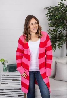 This item is in stock and ready to be shipped. Furthermore, it can also be picked up locally in Magnolia, TX. If you spend more than $99, the shipping costs will be covered by me! I adore the combination of pink and red stripes in this sweater fabric cardigan. It's incredibly soft and stretchy, offering a comfortable length. Fabric: 100% polyester Fit: true to size Model sizing: Catherine is wearing a small and Amy is wearing her true size 3XL. MEET THE MODEL! Catherine is normally a size small Pink And Red Stripes, Stripes Sweater, Sweater Fabric, Warm Hug, Striped Cardigan, Pink And Red, Stripe Sweater, Magnolia, Sweater Cardigan