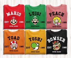 Chemise famille Super Mario, chemise anniversaire Super Mario, chemise famille Super Mario, t-shirt assorti Mario & Friend Party, chemise famille Mario Bonjour ! Merci de soutenir les petites entreprises. Ma priorité absolue est d'assurer la satisfaction de mes clients. Nos chemises sont de haute qualité, super douces et incroyablement confortables. Ils sont fabriqués avec du vinyle de qualité supérieure et pressés à l'aide d'une presse à chaud de première classe. 𝗧𝗢 𝗢𝗥𝗗𝗘𝗥 Consultez toute Mario Shirt Ideas, Bowser Shirt, Super Mario Birthday Shirt, Friend Party, Mario Shirt, Super Mario Birthday, Mario Birthday, Play Game, Mario Bros.