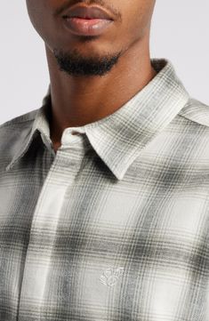 A softly brushed blend of cotton, linen and wool brings exceptional comfort to a shirt that's patterned in a gradient check and sized for layering in the cold. Hidden-button placket Spread collar Long sleeves with button cuffs 56% cotton, 30% linen, 14% wool Dry clean or hand wash, dry flat Imported Plaid Wool Long Sleeve Shirt, Plaid Wool Shirt For Fall, Casual Plaid Wool Top, Fall Plaid Wool Shirt, Casual Wool Shirt With Relaxed Fit, Classic Plaid Wool Flannel Shirt, Classic Wool Plaid Flannel Shirt, Casual Plaid Wool Shirt, Classic Plaid Wool Tops