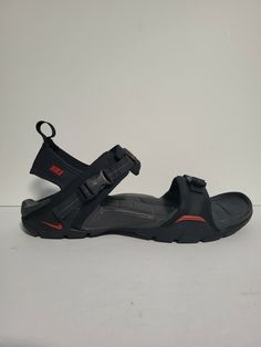 Gentle Worn ' In good condition. Nike Straprunner VI Men's sandal Size 12 style#312560 061 black & Red.. Black Slip-on Sport Sandals For Outdoor Activities, Sporty Slip-on Sandals For Outdoor, Breathable Open Toe Sandals For Outdoor Activities, Breathable Open Toe Sandals For Outdoor, Sporty Closed Toe Sandals For Outdoor Activities, Functional Breathable Slip-on Sandals, Sporty Closed Toe Outdoor Sport Sandals, Sporty Closed Toe Sandals For Outdoor, Sports Sandals With Cushioned Synthetic Footbed