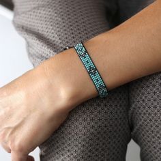 Handmade loom beaded bracelet for women, looking unique, striking, this turquoise bracelet can be it! All bracelets are handmade and made with detailed attention Adjustable bracelets makes the perfect gifs for any event and occasion.  ✎ You will receive it gift wrapped for no additional charge.  ✎ The sliding knot closure adds an element of design and makes it flexible for different size wrists. The ends of the string are secured by sterling silver beads. More Jewelry!  https://www.etsy.com/shop/NatureWish Thank you for stopping by! NarureWish©. All rights reserved Sliding Knot Closure, Bracelet Miyuki, Miyuki Bracelet, Seed Bead Bracelet, Perfect Gif, Elements Of Design, Sliding Knot, Seed Bead Bracelets, Loom Beading