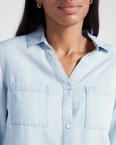 A button-up shirt that adds a touch of utility to your everyday! Regular fit with a collared V-neck, two breast pockets and a classic shirttail hem. Made of breathable, ultra-soft 100% lyocell. | Ginger Shirt Top for Women by Thread & Supply from Wantable