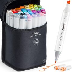 a black bag with markers and pens in it next to an orange marker pen holder