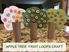 apple tree fruit loops craft made out of toilet paper and rolled up to look like trees