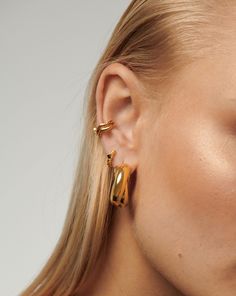 Lucy Williams Chunky Medium Entwine Hoop Earrings | 18k Gold Plated. A Best Selling Lucy Williams X Missoma Design. Inspired by 80S Maximalism, these Chunky Hinged Double Hoops Feature a Unique Crossover Design. Just as Standout on their Own as they are Part of a Curated Ear Stack. Metal: 18K Gold Plated on Brass Dimensions: 26 mm Hoops; Width 10. 6 mm Weight: 15g Pair Product Code: Lws-G-E3-Ns Classic Yellow Gold Hoop Clip-on Earrings, Classic Gold Plated Ear Cuff, Classic Gold-plated Tarnish-resistant Ear Cuff, Classic 14k Gold Ear Cuff, Classic Gold-plated Yellow Gold Ear Cuff, Classic Yellow Gold-plated Ear Cuff, Classic Gold Hoop Ear Cuff, 14k Gold Ear Cuff For Formal Occasions, Yellow Gold Plated Hoop Clip-on Earrings