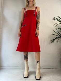 "- Vintage 1970s red sleeveless mini dress - Floral Details on straps - Zipper up the back as well as ties - Handmade, no tags - Small Bust: 15.5\" Length: 40\"" Red Vintage Knee-length Mini Dress, 1970s Style Red Summer Dresses, 1970s Red Summer Dresses, Red 1970s Style Summer Dress, Red Sleeveless Mod Dress, Red Retro Mini Dress, Retro Red Mini Dress, Mini Shift Dress, Sleeveless Mini Dress