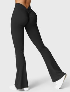 These v-waist flared leggings are not only stylish and comfortable, but also made from a double-sided brushed fabric that feels nude and breathable. They are sag-resistant, compressive, and stretchy, ensuring they stay in place and move with you. The V-shaped waistband design on the back adds style and practicality, while the back wave pleats accentuate the peach butt, making for unique and flattering detail. Overall, these leggings are a great addition to any closet.   Feature:   Inside length Waistband Design, Flare Legging, Flared Leggings, Vintage Flare, Sport Bra Top, Flare Leggings, Flare Trousers, Flared Pants, Long Sleeve Romper