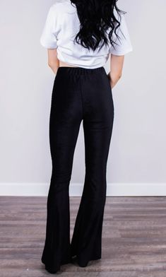 Fitted black high-rise corduroy pant with a bell bottom silhouette. Fits true to size. Stretch Flare Corduroy Bottoms, Stretch Corduroy Flare Bottoms, Chic Black Velvet Pants, Black Velvet Bottoms For Night Out, Black Fitted Velvet Pants, Fitted Black Velvet Pants, Black Wide Leg Corduroy Pants, Casual Stretch Velvet Bottoms, Stretch Velvet Flare Bottoms