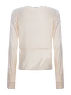 Blouse Pinko "Baradero" in stretch silk satin in Ivory colour. V-neck. Slightly crossed. Torchon detail. Long sleeves. Cuffs with two buttons. Zip closure on the side.Gender: WomenMaterial: SETA STRETCHColor: BeigeMade in: TRProduct ID: 100108-ZR64O62*Import tax/duty will be calculated at checkout (If applicable) Elegant Tailored V-neck Top, Formal Silk V-neck Top, Cream Silk Top For Workwear, Beige V-neck Tops For Formal Occasions, Formal Beige V-neck Tops, Silk Cream Evening Blouse, Cream Silk Evening Blouse, Beige Silk Blouse For Evening, Beige Silk Blouse For Evening Wear