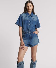 Get ready to roll in the ROSEWOOD BLUE TAYLOR JUMPSUIT. ROSEWOOD BLUE is a perfect deep mid-blue denim wash with contrast tobacco top-stitching. Complete with interior floral print - visible when the underside is shown. Elegant and sexy contemporary-styled denim jumpsuit/playsuit. Comfy elasticated waist to cinch you in. Western-style short sleeved shirt in the top. Flippy flattering curved hem shorts in the bottom. Two front squared chest patch pockets and internal side pockets. Classic yo Low Waist Skirt, Denim Jumpsuits, Jumpsuit Online, Flare Leg Jeans, One Teaspoon, Midi Maxi Dress, Denim Jumpsuit, Top Stitching, Western Style