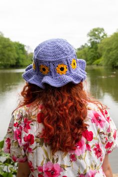 This hat is made of sunflower granny squares and finished off with an adorable ruffled brim that will shade your eyes from the sun as you enjoy a day at the park, up a tree, or at the beach!  It is handmade to order out of 100% acrylic yarn. Playful Brimmed Crochet Hat For Summer, Fun Sun Hats For Spring, Cute Flower Hat For Beach, Playful Wide Brim Crochet Hat For Summer, Whimsical Wide Brim Bucket Hat For Summer, Handmade Whimsical Summer Bucket Hat, Handmade Spring Sun Hat, Whimsical Summer Crochet Bucket Hat, Whimsical Adjustable Crochet Hat For Beach