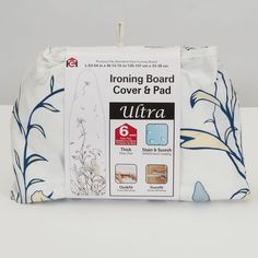 the front of an ironing board cover and pad