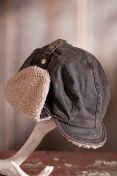 Weathered Cotton Trooper Hat By Overland Sheepskin Co, http://www.overland.com/Products/NewNotable-590/SaleRoom-536/MensSaleAccessories-554/WeatheredCottonTrooperHat/PID-78199.aspx Trooper Hat, Warm Winter Hats, Winter Hat, Warm Winter, Winter Hats, Comfort Fit, Buckle, Hats