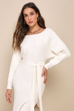 The Lulus Cozy Captivation Ivory Ribbed Dolman Sleeve Midi Sweater Dress is perfect for looking a little extra flirty while sitting fireside this season! Stretchy, ribbed sweater knit shapes a flattering boat neckline and dolman-style sleeves with fitted cuffs. A matching tying sash cinches at the waist of the figure-flaunting bodycon silhouette, that falls to a midi hem with side seam slits. Fit: This garment fits true to size. Length: Mid-calf length. Size medium measures 50.5" from shoulder t Formal Sweater, Sweater Midi Dress, Cozy Sweater Dress, Midi Sweater Dress, Lulu Fashion, Sweater Dress Midi, Boat Neckline, Sweater Knit, Ribbed Sweater