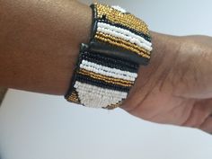 Beautifully handcrafted Blends well with all outfits Made of fine beads https://www.etsy.com/shop/naistumityujewelry Colorful Beaded Bracelets As Fashion Accessory, Unique Adjustable Black Beads, Elegant Handmade Adjustable Leather Bracelet, Elegant Handmade Beaded Bracelets For Festivals, Elegant Beaded Bangle Bracelets For Festivals, Elegant Handmade Adjustable Wristlet, Adjustable Black Beaded Bracelets For Fashion, Festival Beaded Bracelets With Black Beads, Leather Bracelet With Colorful Round Beads For Gift