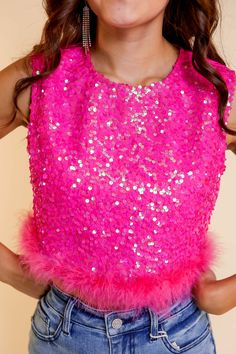 Introducing the "Feather or Not Sequins Crop Top" by Southern Grace, the ultimate statement piece for confident women who love to shine! This hot pink sequins top with its mesmerizing sparkle and playful feather trim is destined to turn heads and ignite your inner diva. Designed for unforgettable occasions like bachelorette parties, nights out on the town, or even attending a Taylor Swift concert, this crop top exudes elegance and radiates glamour. The vibrant hot pink sequins catch the light wi Hot Pink Sequin Top, Hot Pink Sparkly Top, Sequin Tops For Women, Pink Sequin Top Outfit, Pink Sparkle Outfit, Celebrities In Pink, Pink Sparkle Top, College Tour Outfit, Cute Pink Tops