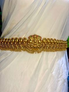 Saree Hip belt chain, best to pair up with saree, lehenga, dresses and many other Asian outfits. Adjustable hip chain with. Latest design Antique traditional waist chain, This stunning piece of art with beautiful multicolor stones & unblemished pearls gives you a whole new look on your special day. This traditional jewelry can be worn on any occasions Engagement anniversary, birthday, festivals or any other .They have Special importance for every occasion. Perfect Gift for your loved ones you can gift this beautiful Antique traditional Choker set on Valentine's day, wedding ceremony, anniversary, Birthday or any other day women's love for jewelry is never ending. Ceremonial Temple Jewelry Bridal Belt With Tilla, Elegant Gold Bridal Belt With Tilla Detailing, Elegant Gold Bridal Belt With Tilla, Festive Gold Bridal Belt With Tilla Detailing, Festive Gold Embroidered Bridal Belt, Traditional Waist Chain With Latkans For Wedding, Traditional Wedding Waist Chain With Latkans, Bollywood Style Wedding Waist Chain With Tilla, Bollywood Tilla Waist Chain For Wedding