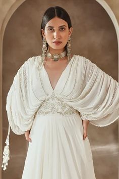 Shop for Seema Thukral Ivory Georgette Draped Bodice Embroidered Gown for Women Online at Aza Fashions White Festive Evening Dress For Wedding, Festive White Evening Dress For Wedding, Reception Dress With Pearl Embroidery And Cape Sleeves, Elegant Hand Embellished Wedding Dress With Traditional Drape, White Dresses With Fitted Bodice For Reception, White Dress With Fitted Bodice For Reception, White Fitted Bodice Dress For Reception, Evening Dresses With Pearl Embroidery And Cape Sleeves, Festive Floor-length White Evening Dress