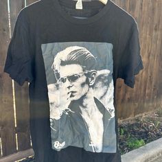 Black With David Bowie Graphic T Shirt Casual Oversized Streetwear Never Worn Cool Black Top With Graphic Print, Edgy Black Shirt With Screen Print, Black Graphic Tee For Spring, Spring Black Graphic Tee Shirt, Edgy Crew Neck Shirt For Spring, Edgy Crew Neck Spring Shirt, Urban Style Screen Print Shirt For Spring, Oversized Black Band Merch Shirt, Cool Black Summer Top