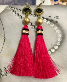 Hot pink tassel earrings, Golden black and hot pink tassel earrings, Victorian style tassel earring, light weight earrings, perfect for evening party.  SIZE: drop length is 6 inches tassel with bead, ear wire length excluded.    CARE: please good take care of your jewelry. Please keep these earrings in safe place. If possible keep these earrings in hanging position. SHIPPING INFO: Your order will be ready in 1-3 business days after confirmation of payment. OTHER INFO: Actual color may vary becau Chic Dangle Tassel Earrings As Gift, Elegant Tassel Earrings With Fringe As Gift, Elegant Pink Tassel Earrings For Pierced Ears, Pink Elegant Tassel Earrings, Chic Tassel Earrings For Party, Handmade Pink Dangle Tassel Earrings, Pink Tassel Earrings With Latkans, Chic Tassel Earrings As A Gift, Chic Evening Earrings With Tassels