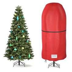 a christmas tree next to an inflatable bag on a stand and a red cover