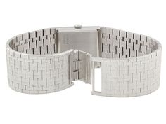 Enliven your look with this funky vintage watch by Piaget. A textured band of white gold culminates in a cool square face for monochrome style that is as trend-setting today as it was when it was made! Dial signed Piaget. Timeless Silver Rectangular Watch Bands, Modern Rectangular Watch Bands With Polished Finish, Modern Platinum Watches In White Gold, Modern Platinum White Gold Watches, Modern Platinum Watch With Polished Finish, Modern Platinum Watches With Polished Finish, Modern White Gold Watch Bands With Diamond Hour Markers, Piaget Watch, Ladies Dress Watches