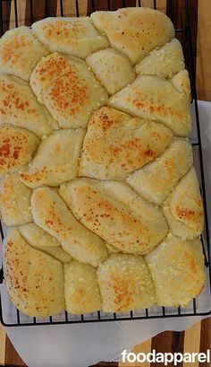 some kind of bread that is on a cooling rack