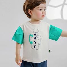 Get your little one ready for sunny days with our Summer Cartoon Cotton Set, perfect for toddlers aged 1-5 years! This unisex baby outfit features a casual style with a cute cartoon pattern that adds a playful touch to their summer wardrobe. 🌞 Made from soft and breathable jersey cotton, this set ensures maximum comfort during warm weather. The short sleeves and lightweight fabric make it ideal for all-day wear, while the true-to-size fit guarantees the perfect look every time. Let your child e Cartoon Style Cotton Top With Letter Print, Cotton Cartoon Style Tops With Letter Print, Cute White Patchwork Top, Cute Short Sleeve Patchwork Tops, Cotton Cartoon Tops With Character Print, Cotton Cartoon Print Tops, Cotton Cartoon Character Print Tops, Cotton Tops With Cartoon Character Print, Green Cartoon Print Tops For Playwear