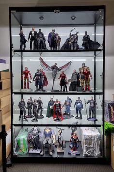 a display case filled with different types of action figures