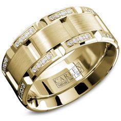 a yellow gold wedding band with diamonds