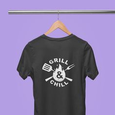 "Get ready for summer with this high-quality \"Grill & Chill\" T-Shirt, perfect for the grill master in your life! Available in four stylish color variations, this tee is a great gift for fathers who love to grill and chill with family and friends. Crafted from top-quality materials, this shirt is comfortable, durable, and sure to become a favorite in any summer wardrobe. Whether you're cooking up a storm at the family BBQ or just relaxing with a cold drink, this tee is the perfect way to show off your love of grilling. With its eye-catching design and comfortable fit, this \"Grill & Chill\" T-Shirt is sure to turn heads and make a statement. Order yours today and get ready to show off your love of grilling in style! Get grilling with our Grill & Chill, grill and chill Unisex T-shirt, T-sh Father's Day Outdoor T-shirt With Graphic Print, Father's Day Outdoor Graphic Print T-shirt, Father's Day Outdoor Graphic T-shirt, Grill And Chill, Fathers Gifts, Family Bbq, Grill Master, Cold Drink, Just Relax