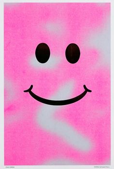 a pink poster with a smiley face drawn on it