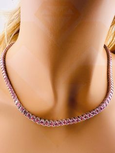 Introducing our Sparkly Pink Tennis Chain, a dazzling and vibrant accessory that transcends conventional jewelry. This exquisite piece is designed for both men and women who crave a touch of flamboyance in their style. The focal point of this tennis necklace is the VVS Fiery Pink Gemstones, which emulate the brilliance of genuine diamonds, creating a stunning and eye-catching display. Crafted with meticulous attention to detail, the simulated diamonds on this tennis chain rival the sparkle of re Pink Chain Jewelry For Formal Occasions, Formal Pink Jewelry With Chain Detail, Formal Pink Jewelry With Chain, Formal Pink Chain Jewelry, Pink Link Jewelry With Adjustable Chain, Pink Link Jewelry For Gifts, Formal Pink Jewelry With Adjustable Chain, Round Tennis Necklace Chain As Gift, Pink Tennis