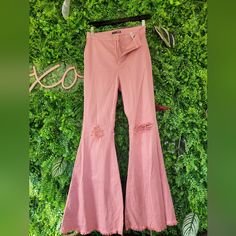 Size 9 Never Worn Chic High Rise Pink Bottoms, High Waist Peach Bottoms For Spring, High-waist Peach Bottoms For Spring, Chic Mid-rise Pink Bottoms, Peach Wide Leg Bottoms For Spring, Pink Flare Bottoms For Spring, Chic Peach Bottoms For Spring, Trendy Pink Flare Bottoms, Fashion Nova Jeans