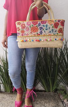 "FREE SHIPPING IN USA This bag is SIZE: 13.5 \"x14\" / 34.2x35.5 cm (height x width) Handmade bag with palm leaves. Perfect summer bag: for the beach, a picnic in the park or to wear your favorite outfit ... very versatile, with all the summer style. This bag is handwoven in Mexico from sustainable palm leaves decorated with unique applications. Materials: palm leaves. Please note that these bags are handmade, shapes and sizes may vary slightly." Rectangular Embroidered Shoulder Bag For Vacation, Eco-friendly Multicolor Festival Bag, Embroidered Rectangular Shoulder Bag For Vacation, Embroidered Rectangular Vacation Bag, Embroidered Natural Straw Travel Bag, Bohemian Woven Straw Satchel Bag, Multicolor Satchel Straw Bag For Vacation, Fair Trade Tote Bag For Vacation, Natural Color Embroidered Tote Bag