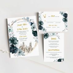 the wedding stationery is laid out on a white surface with blue flowers and greenery