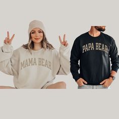 FREE SHIPPING IN THE US! No order minimum!  Mom and Dad Sweatshirts, Mama Bear Shirt, Papa Bear Shirt, Gift for Mom and Dad, Gift for New Parents, Pregnancy Announcement Shirts ♥ The CREWNECK * This is a Gildan 18000 crewneck sweatshirt. * Detailed sizing information can be found in the size chart in the photos. * Printed in the USA. ♥ CARE ＊Machine wash cold, inside-out, gentle cycle ＊Wash with mild detergent and similar colors ＊Tumble dry low or hang-dry ＊Do not bleach or fabric softeners ＊Do not iron directly onto the design ＊Do not dry clean ♥ PRODUCTION & SHIPPING ＊Each sweatshirt is made to order. ＊Production time : 2-7 business days (Excluding weekends, holidays) ＊US Shipping time : 3-6 business days ＊Most US customers received the order within 5-10 days of the order date. ＊If you h Casual Tops With Name Print For Loungewear, Casual Relaxed Fit Sweatshirt For Family, Family Matching Graphic Print Sweatshirt, Mama Bear Papa Bear Shirts, Parents Pregnancy Announcement, Mama Bear Baby Bear, Papa Bear Shirt, Bar Shirt, Mama Bear Shirt