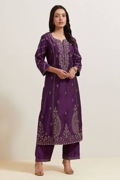 Purple natural weaves chanderi silk kurta with contrast paisley and floral embroidery. Comes with pant and shimmer organza dupatta.
Components: 3
Pattern: Embroidered
Type Of Work: Floral and Paisley
Neckline: Notched
Sleeve Type: Three Quarter
Fabric: Chanderi Silk, Shimmer Organza
Color: Purple
Other Details: 
Embroidered hem pant
Fringed border dupatta
Occasion: Puja - Aza Fashions Designer Tussar Silk Palazzo Set With Resham Embroidery, Festive Tussar Silk Palazzo Set With Resham Embroidery, Chanderi Palazzo Set With Resham Embroidery For Diwali, Festive Tussar Silk Palazzo Set With Straight Kurta, Festive Resham Embroidered Tussar Silk Palazzo Set, Embroidered Tussar Silk Palazzo Set For Eid, Tussar Silk Palazzo Set With Resham Embroidery For Eid, Festive Unstitched Tussar Silk Palazzo Set, Designer Tussar Silk Salwar Kameez With Straight Kurta