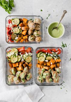 three glass containers filled with food next to a cup of green sauce and napkins